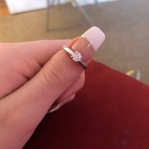 1/4 carat diamond solitaire ring set in white gold